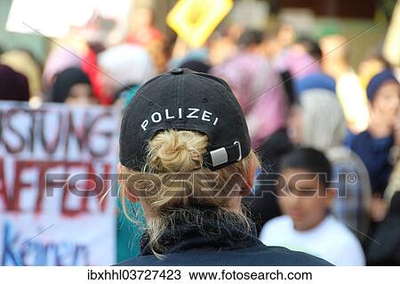 "Police officer at a demonstration, Germany, Europe" View Large Photo Image Stock Image - "Police officer at a demonstration, Germany, Europe". Fotosearch
