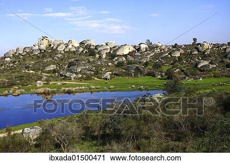 "Pond and granite rocks in the Los Barruecos Nature Monument, Extremadura, Spain, Europe" View Large Photo Image Stock Image - "Pond and granite rocks in the Los Barruecos Nature Monument, Extremadura, Spain, Europe". Fotosearch