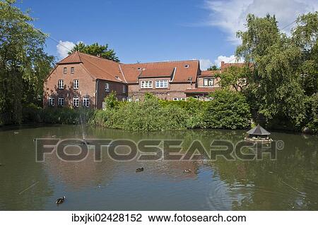 Stock Image - "Pond, Luetjenburg, Schleswig-Holstein, Germany, Europe". Fotosearch