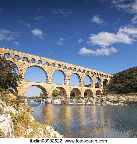"Pont du Gard, 2000 year old Roman Aquaduct, Vers-Pont-du-Gard, Languedoc-Roussillon, France, Europe" View Large Photo Image Stock Image - "Pont du Gard, 2000 year old Roman Aquaduct, Vers-Pont-du-Gard, Languedoc-Roussillon, France, Europe". Fotosearch