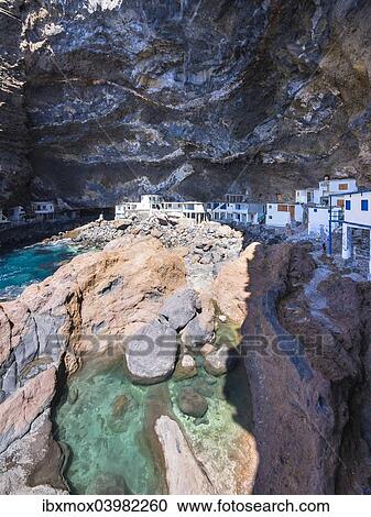 "Poris de Candelaria, houses in a cave, rocky coast on the Camino del Poris, Pirate's Cove, Tijarafe, La Palma, Canary Islands, Spain, Europe" View Large Photo Image Stock Image - "Poris de Candelaria, houses in a cave, rocky coast on the Camino del Poris, Pirate's Cove, Tijarafe, La Palma, Canary Islands, Spain, Europe". Fotosearch