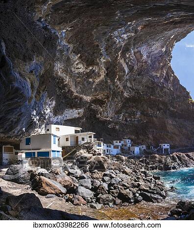 "Poris de Candelaria, houses in a cave, rocky coast on the Camino del Poris, Pirate's Cove, Tijarafe, La Palma, Canary Islands, Spain, Europe" View Large Photo Image Stock Photograph - "Poris de Candelaria, houses in a cave, rocky coast on the Camino del Poris, Pirate's Cove, Tijarafe, La Palma, Canary Islands, Spain, Europe". Fotosearch
