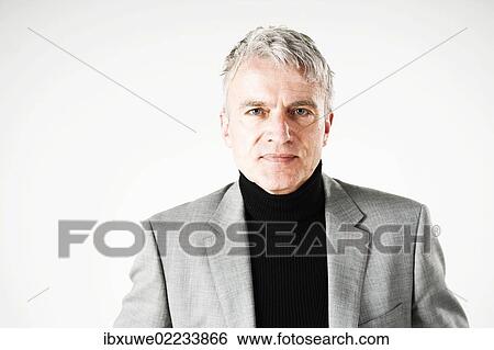 Stock Photograph - Portrait of a businessman with a serious face. Fotosearch