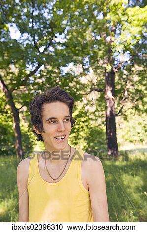 "Portrait of young man in nature, Sweden, Europe" View Large Photo Image Stock Image - "Portrait of young man in nature, Sweden, Europe". Fotosearch