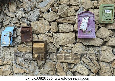 "Post boxes on a stone wall, Vallebona, Liguria, Italy, Europe" View Large Photo Image Stock Photography - "Post boxes on a stone wall, Vallebona, Liguria, Italy, Europe". Fotosearch