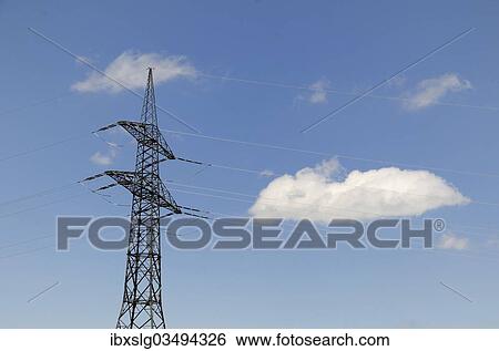 "Power pole, high voltage power line, transmission line, with white clouds, Bavaria, Germany, Europe" View Large Photo Image Stock Photograph - "Power pole, high voltage power line, transmission line, with white clouds, Bavaria, Germany, Europe". Fotosearch