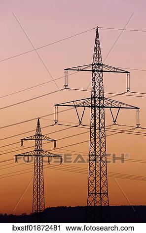 "Power poles, evening sky" View Large Photo Image Stock Image - "Power poles, evening sky". Fotosearch