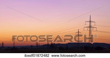 "Power poles, evening sky" View Large Photo Image Stock Image - "Power poles, evening sky". Fotosearch