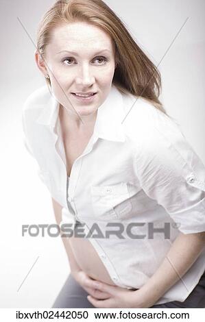 Stock Image - Pregnant woman. Fotosearch