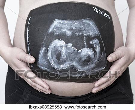 Pregnant woman with a body paint of an ultrasound image on her belly View Large Photo Image Stock Photo - Pregnant woman with a body paint of an ultrasound image on her belly. Fotosearch