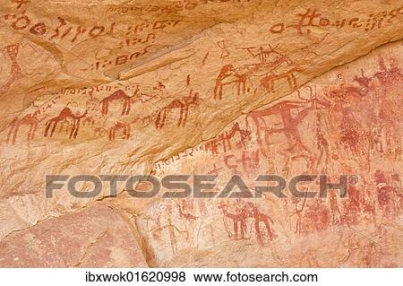 "Prehistoric rock drawings in the Tadrart Valley, Akakus Mountains, Libyan Desert, Libya, Sahara, North Africa, Africa" View Large Photo Image Stock Photo - "Prehistoric rock drawings in the Tadrart Valley, Akakus Mountains, Libyan Desert, Libya, Sahara, North Africa, Africa". Fotosearch