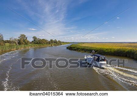 "Prerower Strom or Prerowstrom, arm of the Baltic Sea, with motorboat, Western Pomerania Lagoon Area National Park, Fischland-Darss-Zingst, Mecklenburg-Western Pomerania, Germany, Europe" View Large Photo Image Picture - "Prerower Strom or Prerowstrom, arm of the Baltic Sea, with motorboat, Western Pomerania Lagoon Area National Park, Fischland-Darss-Zingst, Mecklenburg-Western Pomerania, Germany, Europe". Fotosearch