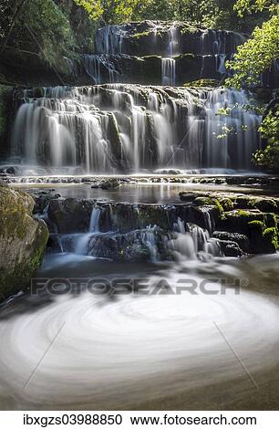 "Purakaunui waterfall, Catlins, South Island, New Zealand, Oceania" View Large Photo Image Stock Image - "Purakaunui waterfall, Catlins, South Island, New Zealand, Oceania". Fotosearch