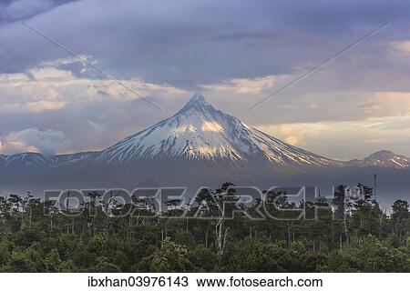 Stock Image - "Puyehue volcano in the evening light, Puyehue, Los Lagos Region, Chile, South America". Fotosearch