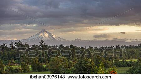 "Puyehue volcano in the evening light, Puyehue, Los Lagos Region, Chile, South America" View Large Photo Image Stock Photo - "Puyehue volcano in the evening light, Puyehue, Los Lagos Region, Chile, South America". Fotosearch