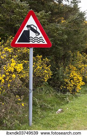 Stock Photo - "Quayside or river bank warning sign, Isle of Skye, Inner Hebrides, Scotland, United Kingdom, Europe". Fotosearch