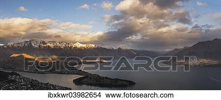 "Queenstown on Lake Wakatipu"""" and The Remarkbales mountain range at sunset, Otago Region, South Island, New Zealand, Oceania" View Large Photo Image Picture - "Queenstown on Lake Wakatipu"""" and The Remarkbales mountain range at sunset, Otago Region, South Island, New Zealand, Oceania". Fotosearch