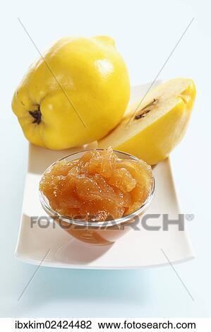 Quince (Cydonia oblonga) on a porcelain plate and a glass bowl with quince jam View Large Photo Image Stock Image - Quince (Cydonia oblonga) on a porcelain plate and a glass bowl with quince jam. Fotosearch