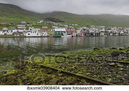 "Rails on a boat ramp, covered in algae, boathouses at the back, Vagar, Faroe Islands, Denmark, Europe" View Large Photo Image Picture - "Rails on a boat ramp, covered in algae, boathouses at the back, Vagar, Faroe Islands, Denmark, Europe". Fotosearch