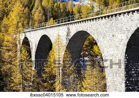 "Railway bridge, Albula Pass road, autumn, Albula Valley, Canton of Graubunden, Switzerland, Europe" View Large Photo Image Stock Photography - "Railway bridge, Albula Pass road, autumn, Albula Valley, Canton of Graubunden, Switzerland, Europe". Fotosearch