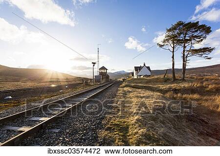 Stock Image - "Railway tracks and a railway station in the Scottish Highlands, Corrour, Highlands, Scotland, United Kingdom, Europe". Fotosearch