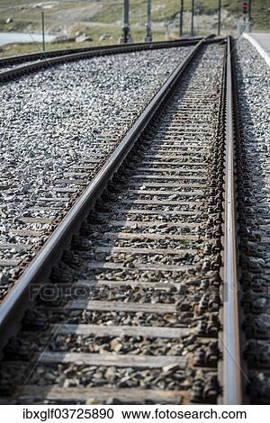"Railway tracks at Bernina Pass, Rhaetian Railway, near Poschiavo, Canton of Graubunden, Switzerland, Europe" View Large Photo Image Stock Image - "Railway tracks at Bernina Pass, Rhaetian Railway, near Poschiavo, Canton of Graubunden, Switzerland, Europe". Fotosearch