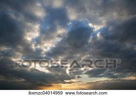 "Rain clouds, nimbostratus, in the evening sky, Deut property land" View Large Photo Image Stock Photo - "Rain clouds, nimbostratus, in the evening sky, Deut property land". Fotosearch