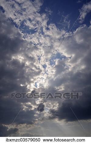 "Rain clouds with sun rays, Eckental, Middle Franconia, Bavaria, Germany, Europe" View Large Photo Image Stock Image - "Rain clouds with sun rays, Eckental, Middle Franconia, Bavaria, Germany, Europe". Fotosearch