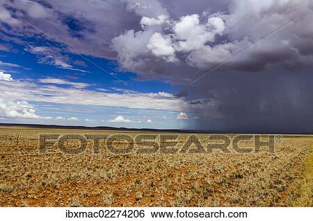 "Rain front approaching at Helmeringshausen on road D707, south of Namibia, Africa" View Large Photo Image Stock Photograph - "Rain front approaching at Helmeringshausen on road D707, south of Namibia, Africa". Fotosearch