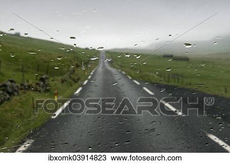 "Rain on a windshield, road, Sandoy, Faroe Islands, Denmark, Europe" View Large Photo Image Stock Image - "Rain on a windshield, road, Sandoy, Faroe Islands, Denmark, Europe". Fotosearch