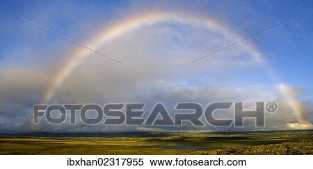 Stock Photography - "Rainbow, Heradsfloi Bay, Iceland, Europe". Fotosearch