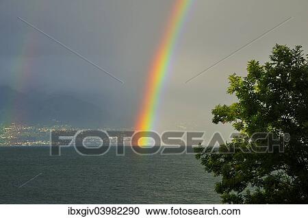 "Rainbow on the shore at Lausanne, Switzerland, from France, Lake Geneva, Lac Leman, Evian-les-Bains, Haute-Savoie, Rhone-Alpes, France, Europe" View Large Photo Image Stock Image - "Rainbow on the shore at Lausanne, Switzerland, from France, Lake Geneva, Lac Leman, Evian-les-Bains, Haute-Savoie, Rhone-Alpes, France, Europe". Fotosearch