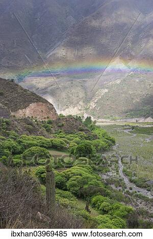 Stock Photography - "Rainbow over the Quebrada de Escoipe valley, Salta Province, Argentina, South America". Fotosearch
