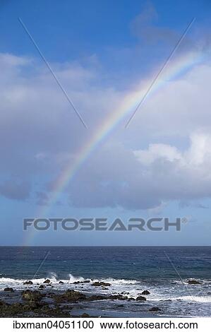Stock Image - "Rainbow over the sea, Valle Gran Rey, La Gomera, Canary Islands, Spain, Europe". Fotosearch