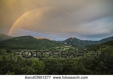 "Rainbow over the valley of Castellane, Provence, Department Alpes-de-Haute-Provence, Provence-Alpes-Cote d'Azur, France, Europe" View Large Photo Image Stock Photo - "Rainbow over the valley of Castellane, Provence, Department Alpes-de-Haute-Provence, Provence-Alpes-Cote d'Azur, France, Europe". Fotosearch