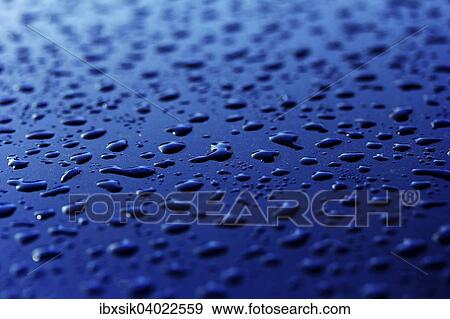 "Raindrops on a car roof, Germany, Europe" View Large Photo Image Stock Photo - "Raindrops on a car roof, Germany, Europe". Fotosearch