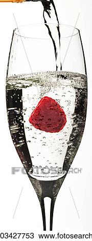 Raspberry in a champagne glass View Large Photo Image Stock Image - Raspberry in a champagne glass. Fotosearch