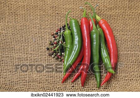 Red and green peppers and peppercorns View Large Photo Image Stock Image - Red and green peppers and peppercorns. Fotosearch