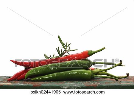 Red and green peppers on an old wooden board View Large Photo Image Stock Photography - Red and green peppers on an old wooden board. Fotosearch