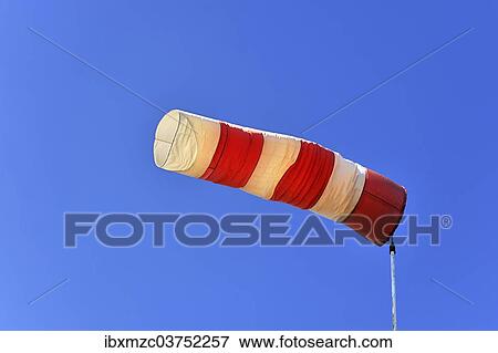 "Red and white windsock against a blue sky, Lilling, Middle Franconia, Bavaria, Germany, Europe" View Large Photo Image Stock Photo - "Red and white windsock against a blue sky, Lilling, Middle Franconia, Bavaria, Germany, Europe". Fotosearch