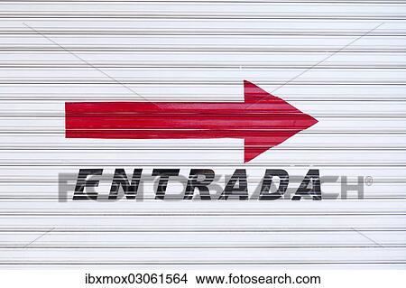 "Red arrow and lettering """"entrada"""", English for """"entrance"""", on a corrugated metal shutter, Teneriffa, Santa Cruz de Tenerife, Tenerife, Canary Islands, Spain, Europe" View Large Photo Image Picture - "Red arrow and lettering """"entrada"""", English for """"entrance"""", on a corrugated metal shutter, Teneriffa, Santa Cruz de Tenerife, Tenerife, Canary Islands, Spain, Europe". Fotosearch