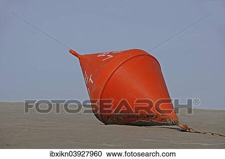 "Red buoy on the beach, St. Peter-Ording, Eiderstedt, North Frisia, Schleswig-Holstein, Germany, Europe" View Large Photo Image Stock Image - "Red buoy on the beach, St. Peter-Ording, Eiderstedt, North Frisia, Schleswig-Holstein, Germany, Europe". Fotosearch