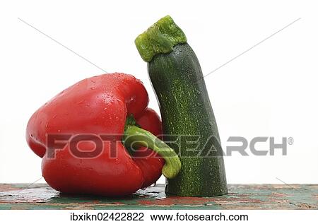 Red capsicum and a zucchini View Large Photo Image Stock Image - Red capsicum and a zucchini. Fotosearch