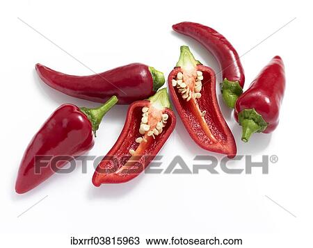 Stock Image - Red chili peppers (Capsicum annuum). Fotosearch