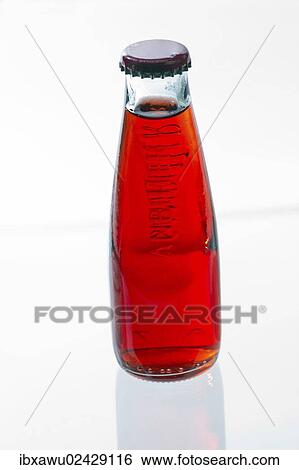 Red drink in a bottle View Large Photo Image Stock Photograph - Red drink in a bottle. Fotosearch