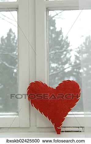 Red fabric heart leaning on an old window with a white frame View Large Photo Image Stock Image - Red fabric heart leaning on an old window with a white frame. Fotosearch