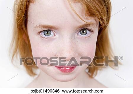 Stock Photograph - "Red-haired girl, portrait". Fotosearch