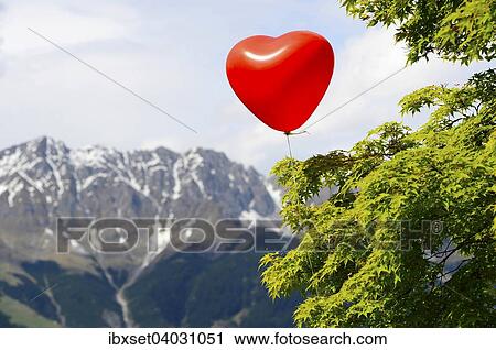 "Red heart balloon, Nordkette, Tyrol, Austria, Europe" View Large Photo Image Stock Image - "Red heart balloon, Nordkette, Tyrol, Austria, Europe". Fotosearch