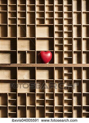 Red heart in empty wooden box with many compartments View Large Photo Image Stock Image - Red heart in empty wooden box with many compartments. Fotosearch