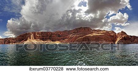 "Red Navajo sandstone cliffs, rock formations, rising from Lake Powell, Page, Arizona, USA" View Large Photo Image Stock Photo - "Red Navajo sandstone cliffs, rock formations, rising from Lake Powell, Page, Arizona, USA". Fotosearch